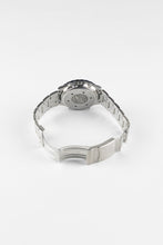 Load image into Gallery viewer, A view of the back of a Breitling Jupiter Pilot watch with the stainless steel bracelet and deployment clasp opened to show the interior engravings and case back.