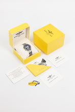 Load image into Gallery viewer, A full Breitling watch set displayed on a white background, including the Jupiter Pilot watch in a signature yellow box with manuals, warranty papers, and a hangtag.