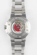 Load image into Gallery viewer, A clear, direct shot of the exhibition case back of an Oris Aquis Date, revealing the automatic mechanical movement and the iconic red Oris rotor.