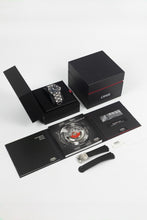Load image into Gallery viewer, A full Oris watch set on a white background, including the Aquis Date watch in its presentation box, outer box, manuals, warranty card, and an additional black rubber strap.