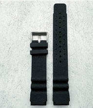 Load image into Gallery viewer, Black watch strap with silver buckle on a light gray background